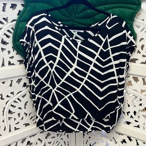 Ava Sky black and white geometric cut off sleeveless blouse top. Size XXS